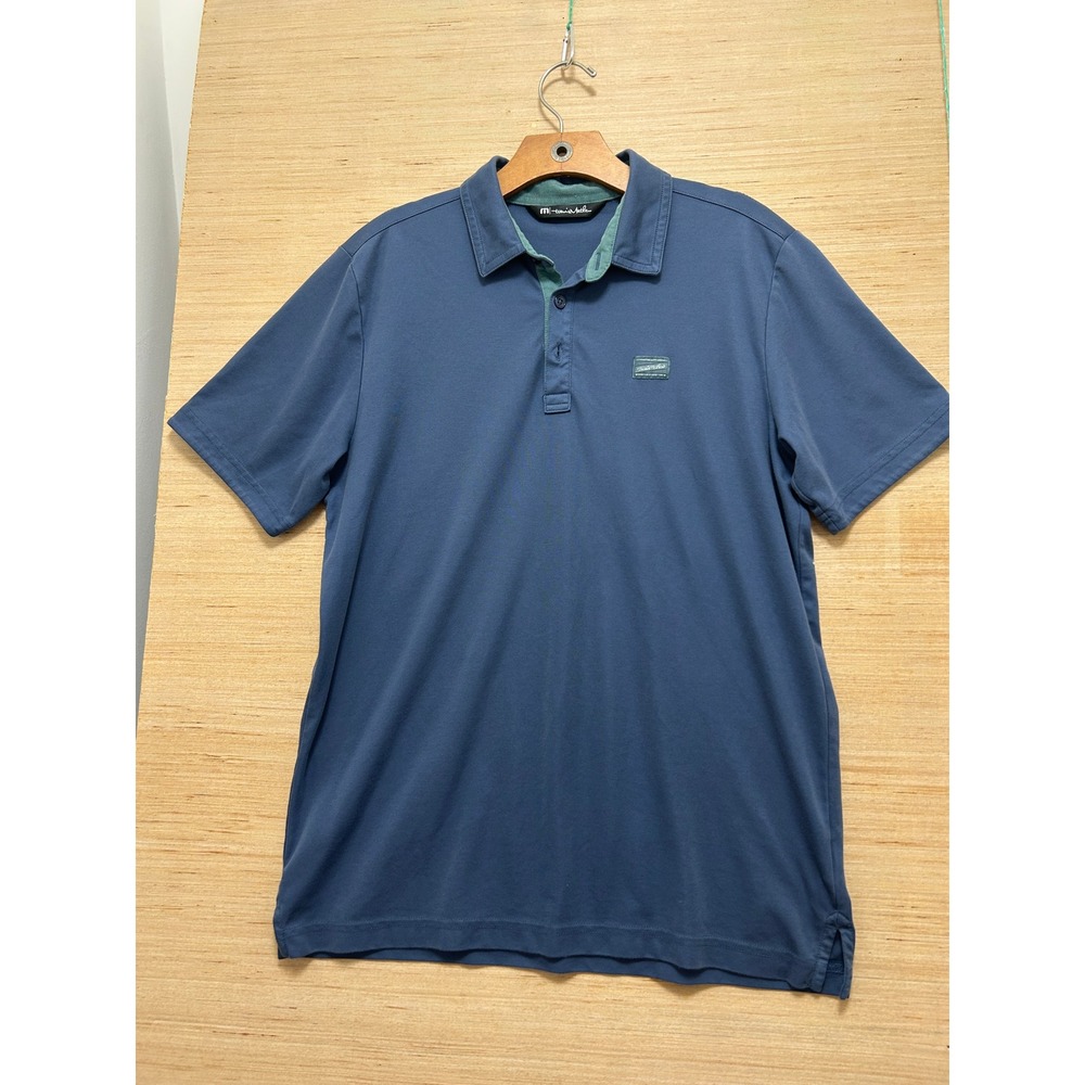 Travis Mathew Navy Polo with Green Collar Trim